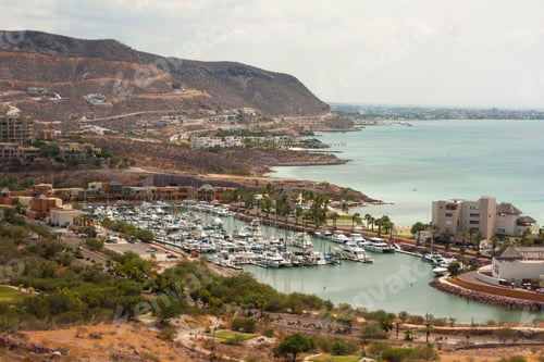 Preview: Aerial shot of the yachts and small boats in a Marina