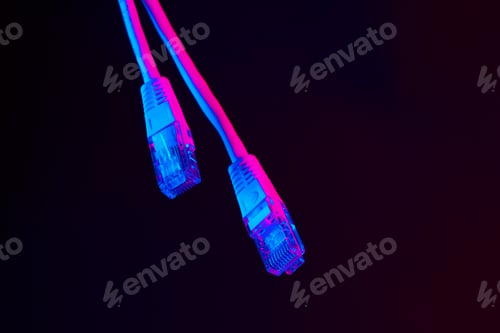 Preview: Modern technology network cable in neon light.