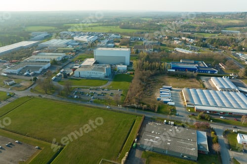 Preview: Aerial view of goods warehouses and logistics center in industrial city zone from above