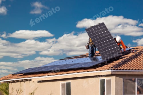Preview: Workers Installing Solar Panels on House Roof