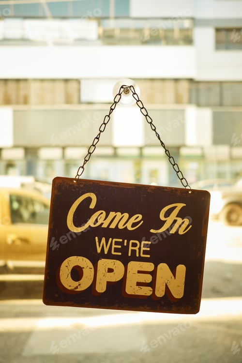 Preview: Open sign at small business window