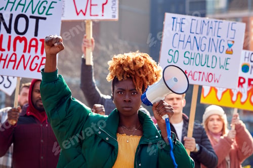 Preview: Group Of Protestors With Placards And Megaphone On Demonstration March Against Climate Chane