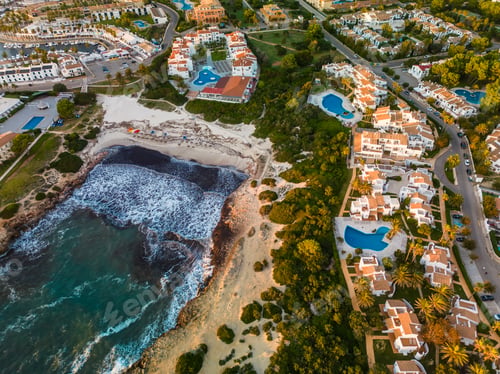 Preview: Aerial drone view of the harbor and the beach of Cala en Bosc, Menorca.