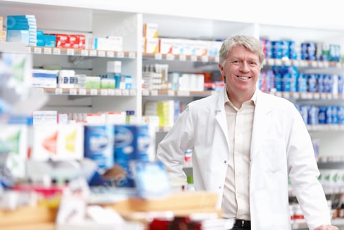 Preview: Male pharmacist at drugstore