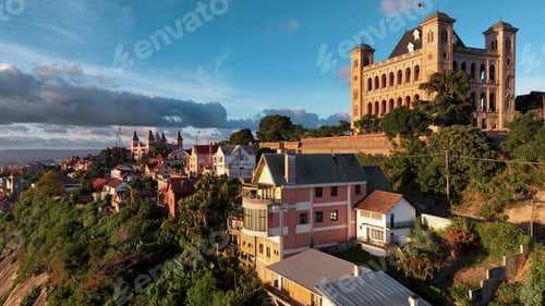 Preview: Aerial view of Antananarivo at sunset showcasing its vibrant architecture and hilly landscape