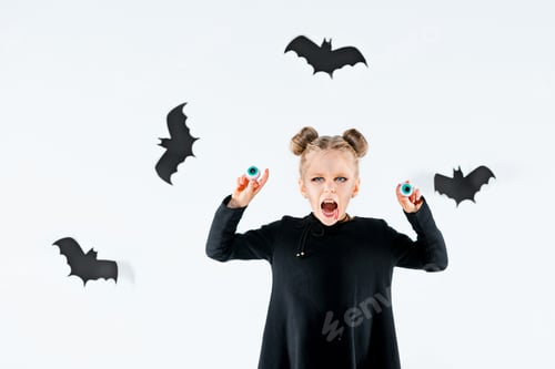 Preview: Little Girl Witch In Black Dress Over Magical Accessories. Halloween