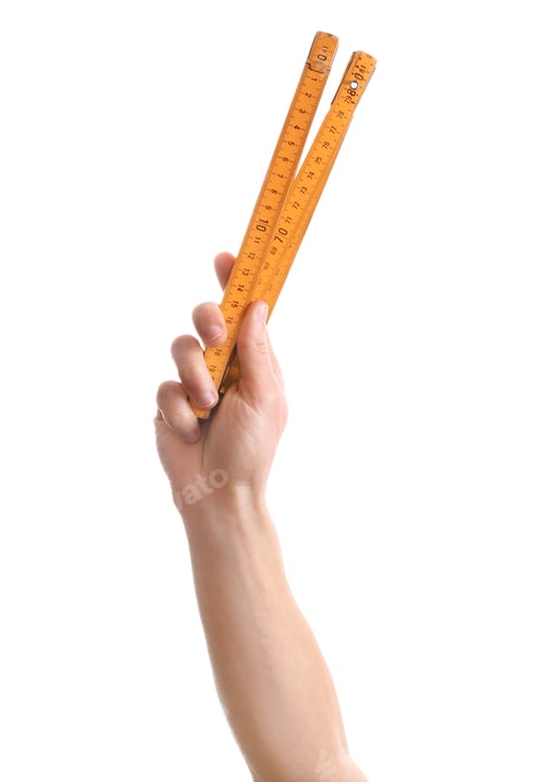 Preview: Man holding folding ruler isolated on white. Construction tools