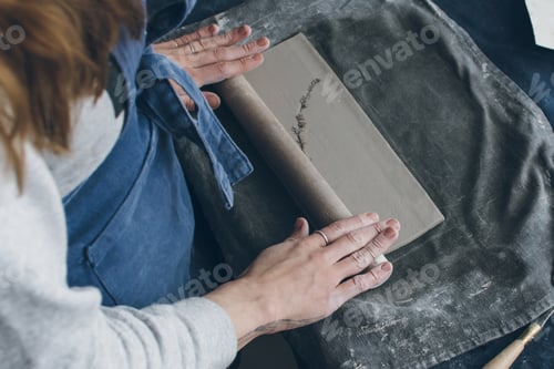 Preview: Ceramic artist working on a clay, small workshop