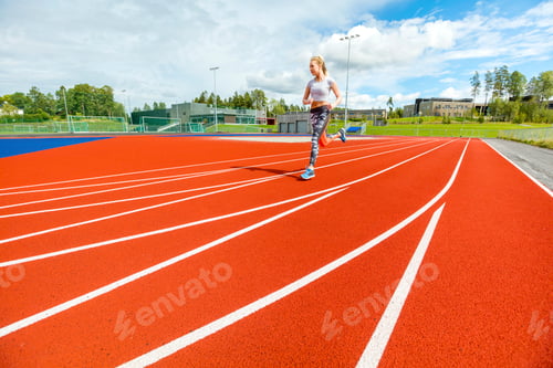 Preview: Young Woman Running On Sports Tracks