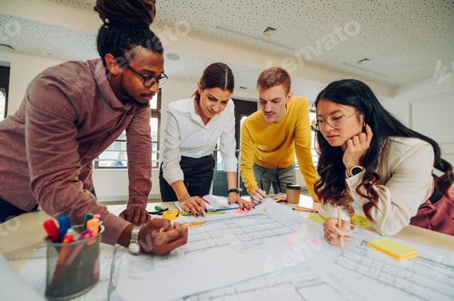 Preview: Multiracial team of engineers or architects having a meeting in an office