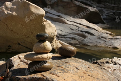 Preview: Heaps of stones by the river.