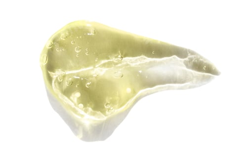 Preview: Translucent slice of yellow aloe vera with bubbles and white background