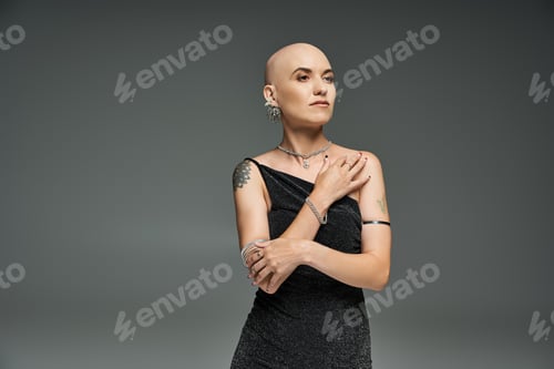Preview: A confident young woman with alopecia showcasing elegance in a striking portrait session