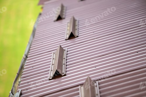 Preview: Metal brown shingle tiling house roof surface, rain gutter pipe and snow guards protective fence