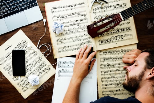 Preview: Man working with musical notes