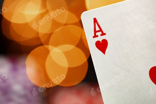 Preview: Playing cards against bokeh background close up