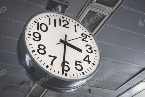 Preview: Classic Train Station Clock. Working hours Office Time in urban city landscape in people lifestyle.