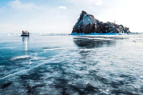 Preview: View of the rock in the frozen lake. Hivus is standing nearby