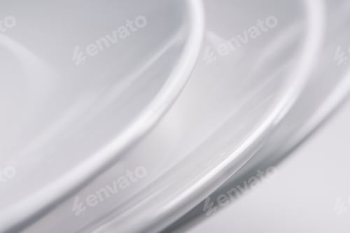 Preview: Close-up view of white ceramic plates