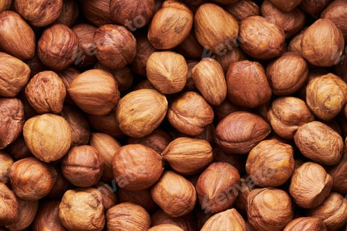 Preview: Hazelnut Background. Heap of peeled hazelnuts, food background