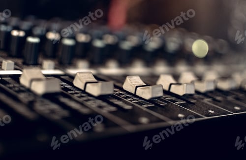 Preview: Close-up selective focus photos of buttons and sliders on sound mixer control panel