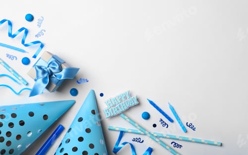 Preview: Flat lay composition with birthday party items on light background