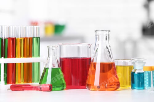 Preview: Different glassware with samples on table in chemistry laboratory