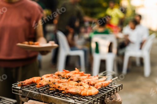 Preview: Skewers with colorful vegetables meat grilling, family friends gathering background, enjoying