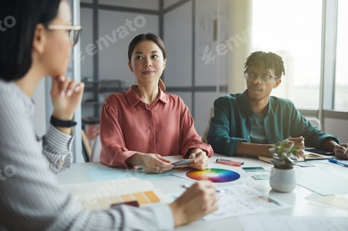 Preview: Designers with customer discussing work