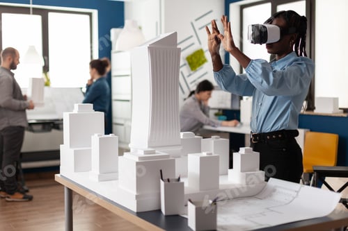 Preview: African american woman using vr glasses at work