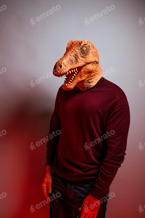 Preview: Man with lizard head in the studio.