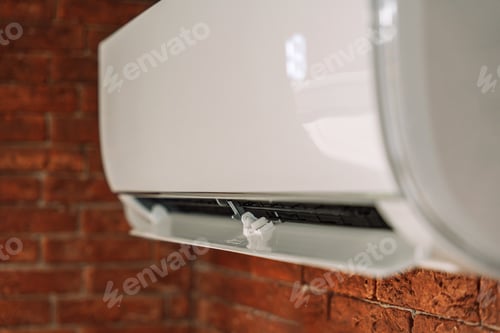 Preview: White air conditioner cools the air to eighteen degrees hanging on a brick wall