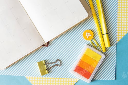 Preview: School supplies. Yellow and blue colors. Empty notebook. Flat lay composition. Space for text.