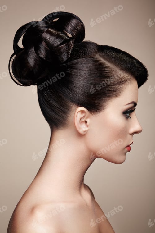 Preview: Elegant Woman with Intricate Dark Hair Updo