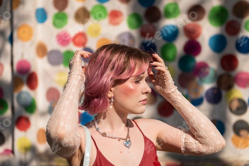Preview: fashion young creative girl , pink colored hair, posing at colorful wall background