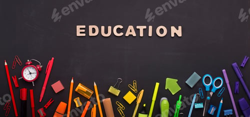 Preview: Rainbow of school supplies on chalk board background