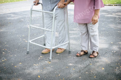 Preview: assisting her senior patient who's using a walker for support