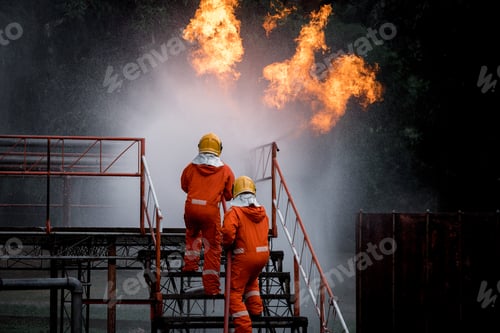 Preview: Firefighters safety using twirl water fog type fire extinguisher to fighting with fire from oil and