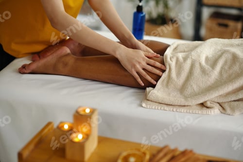 Preview: Receiving Relaxing Leg Massage in Spa Environment