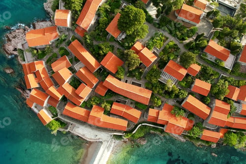Preview: Amazing sunset aerial top drone view of Sveti Stefan hotel island with historical town