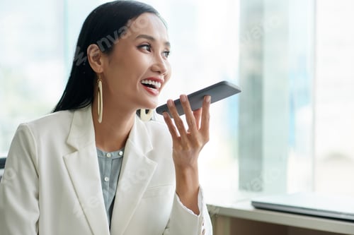 Preview: Female Entrepreneur Recording Voice Message