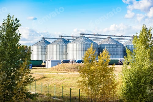 Preview: Silver silos on agro manufacturing plant for processing drying cleaning