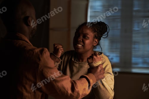 Preview: Woman with clenched fists and teeth