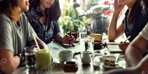 Preview: Friends Planning Adventures over Coffee and Maps