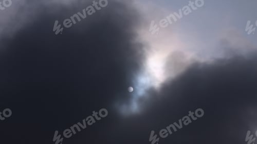 Preview: Afternoon Sun Amid Storm Clouds - Photograph Of An Afternoon Sun Barely Visible Among Dark Stormy