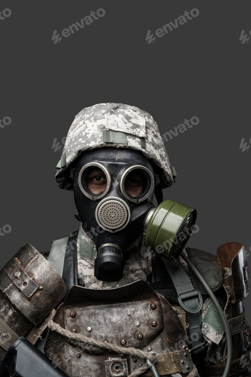 Preview: African soldier with gas mask and rifle dresed in uniform