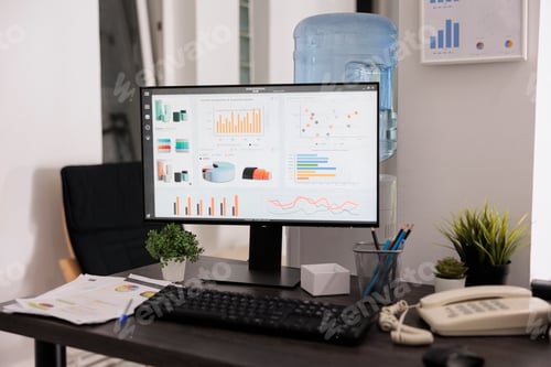 Preview: Close up view of monitor with sales growth graphs