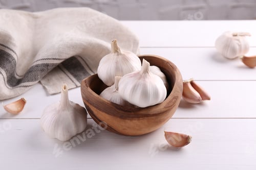 Preview: Fresh garlic on white wooden table, closeup