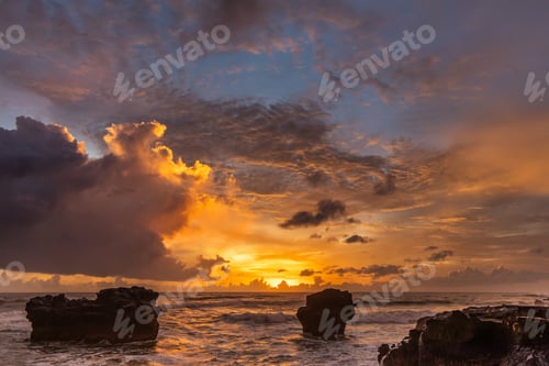 Preview: Amazing colorful bright tropical sunset in Bali island. Red, blue and orange colored clouds.