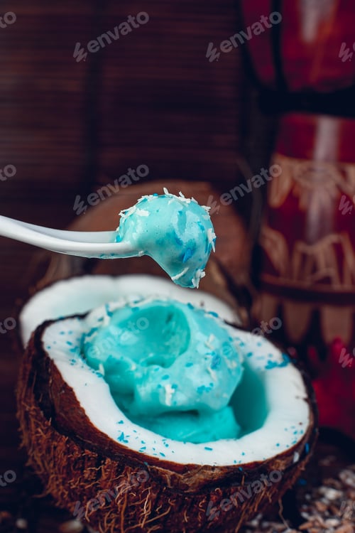 Preview: Blue ice cream in coconut bowl.